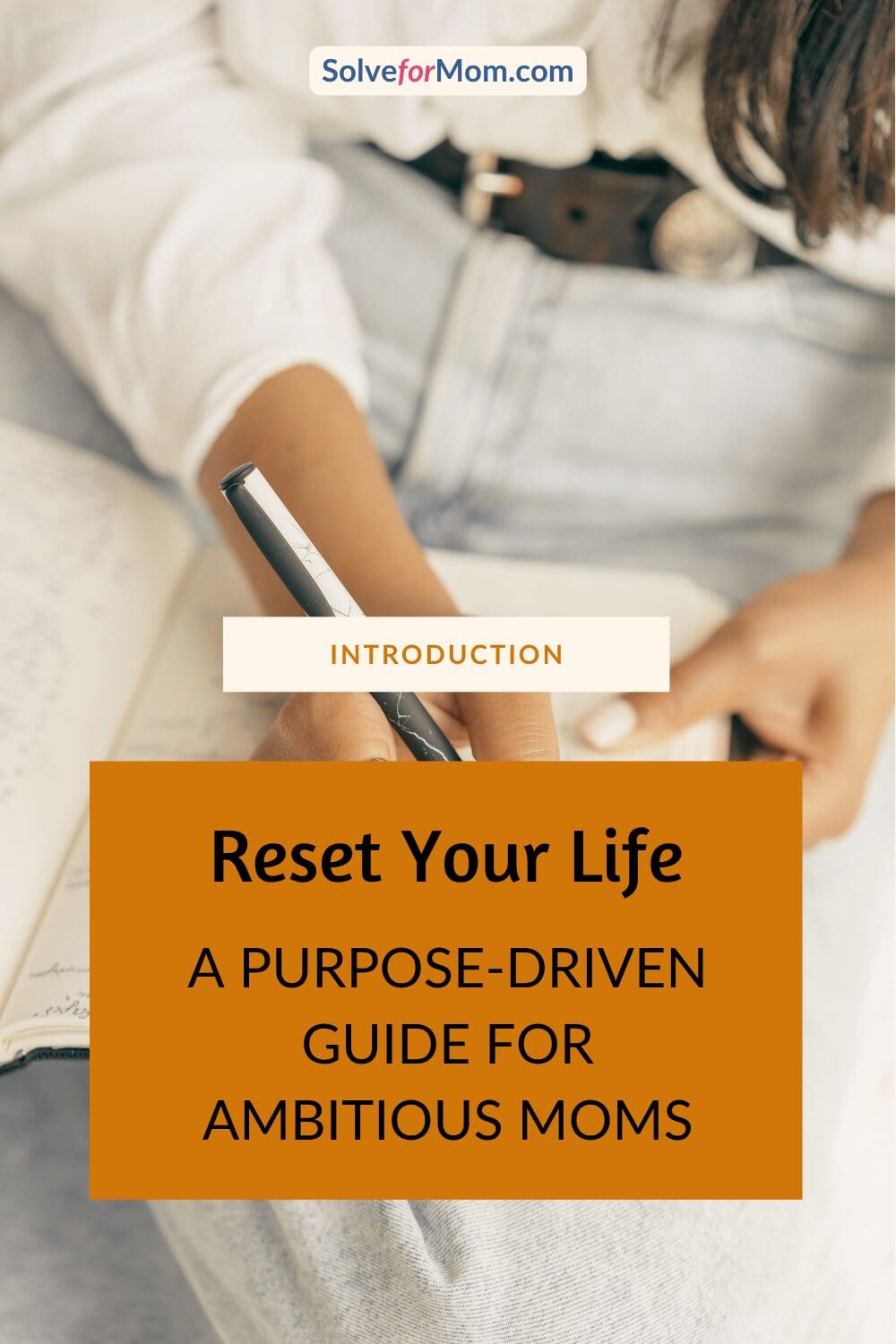 Woman writing in a journal while planning a life reset