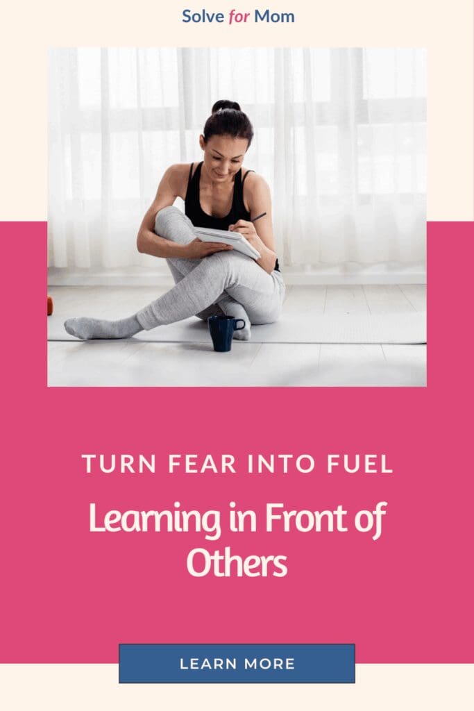 Woman learning in front of people while journaling on yoga mat, showcasing confidence in personal growth despite vulnerability - Solve for Mom